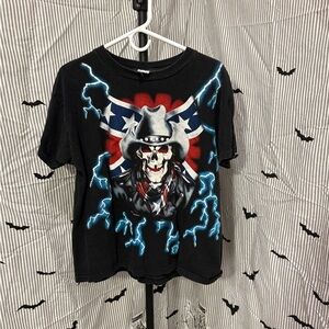 ITEM#63 Skeleton with Cowboy Hat & Flag Wrapping - Black Shirt - L

21x25